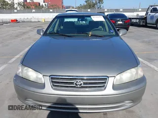 2000 Toyota Camry CE z VIN JT2BG22K4Y0394606, wystawiony jako IAAI lot #42342175 z przebiegiem 245 616 mil mil oraz . Historia ofert i sprzedaży dostępna na DreamBid. Obrazek 6.