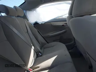 2012 Toyota Corolla L with VIN 2T1BU4EE3CC876841, listed as a IAAI auction lot 41651639 with 124,004 mi miles. Bid and sale history available at carsss.com. Image 8.