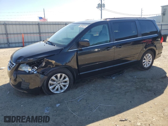 2014 Volkswagen Routan SE with VIN 2C4RVABG9ER135273, listed as a Copart auction lot 45343575 with 94,528 mi miles and Salvage title. Bid and sale history available at DreamBid. Image 1.
