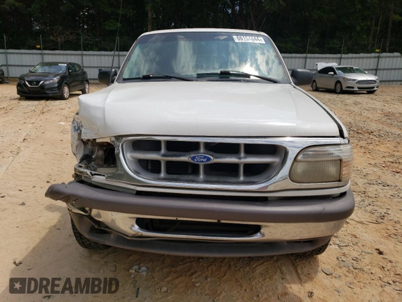 1997 Ford Explorer XL with VIN 1FMDU32E8VUC60285, listed as a Copart auction lot 66154644 with 219,066 mi miles and Salvage title. Bid and sale history available at DreamBid. Image 5.
