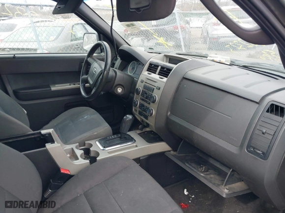 2011 Ford Escape XLT with VIN 1FMCU9D79BKB81857, listed as a IAAI auction lot 41736042 with 999,999 mi miles. Bid and sale history available at carsss.com. Image 5.