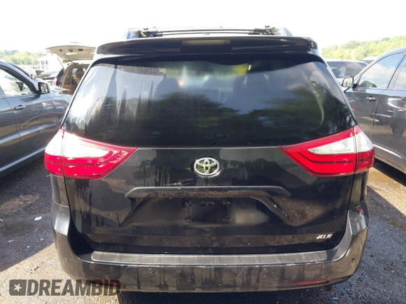 2015 Toyota Sienna XLE with VIN 5TDYK3DC8FS574645, listed as a IAAI auction lot 42528851 with 164,408 mi miles and . Bid and sale history available at DreamBid. Image 17.