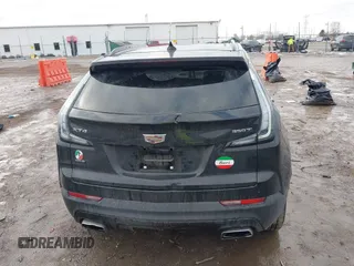2021 Cadillac XT4 AWD Sport with VIN 1GYFZFR49MF065225, listed as a IAAI auction lot 41191994 with 58,095 mi miles and . Bid and sale history available at DreamBid. Image 16.