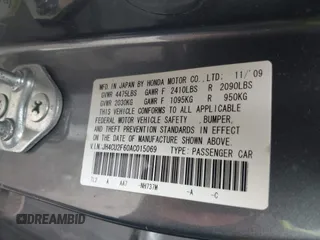 2010 Acura TSX with VIN JH4CU2F60AC015069, listed as a IAAI auction lot 42047083 with 165,671 mi miles. Bid and sale history available at carsss.com. Image 9.