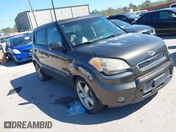 2011 Kia Soul + with VIN KNDJT2A22B7243696, listed as a IAAI auction lot 41762093 with 195,696 mi miles. Bid and sale history available at carsss.com. Image 1.