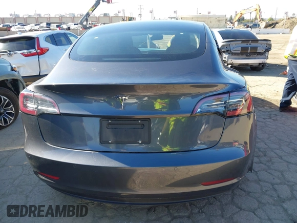 2022 Tesla Model 3 with VIN 5YJ3E1EA3NF165054, listed as a IAAI auction lot 41805729 with 225,773 mi miles. Bid and sale history available at carsss.com. Image 15.