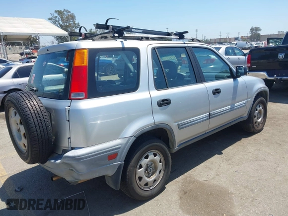 1999 Honda CR-V LX with VIN JHLRD2847XC000944, listed as a IAAI auction lot 42082593 with 198,474 mi miles. Bid and sale history available at carsss.com. Image 4.
