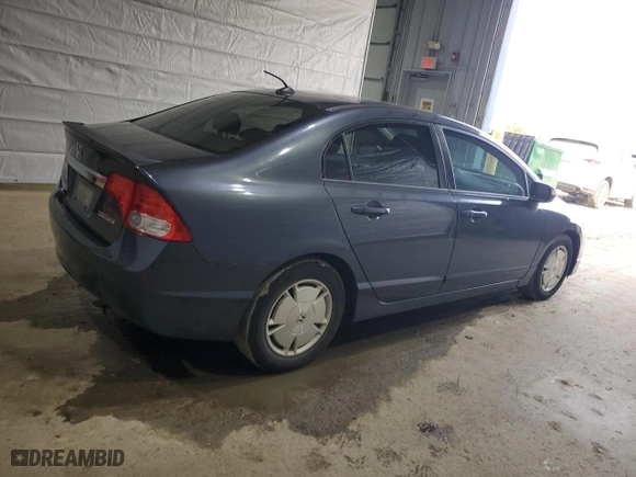 2009 Honda Civic Hybrid with VIN JHMFA36229S009624, listed as a Copart auction lot 50682165 with 169,009 mi miles and Salvage Title. Bid and sale history available at carsss.com. Image 3.