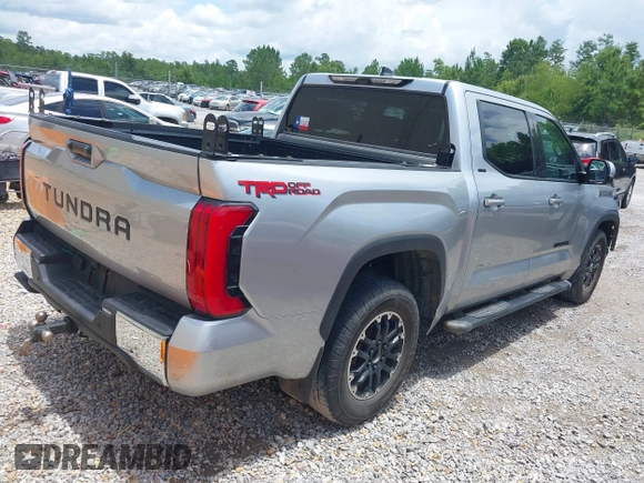 2022 Toyota Tundra SR5 with VIN 5TFLA5AB3NX017848, listed as a IAAI auction lot 42429134 with 53,883 mi miles and . Bid and sale history available at DreamBid. Image 4.
