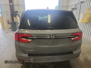 2023 Honda Odyssey Elite with VIN 5FNRL6H90PB071988, listed as a Copart auction lot 58589585 with 12,998 mi miles and Salvage title. Bid and sale history available at DreamBid. Image 6.