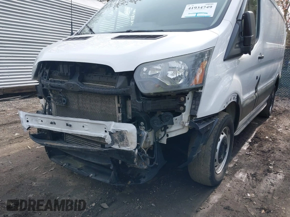 2015 Ford Transit Cargo with VIN 1FTNE1YG3FKA37376, listed as a IAAI auction lot 41934749 with 294,351 mi miles. Bid and sale history available at carsss.com. Image 6.