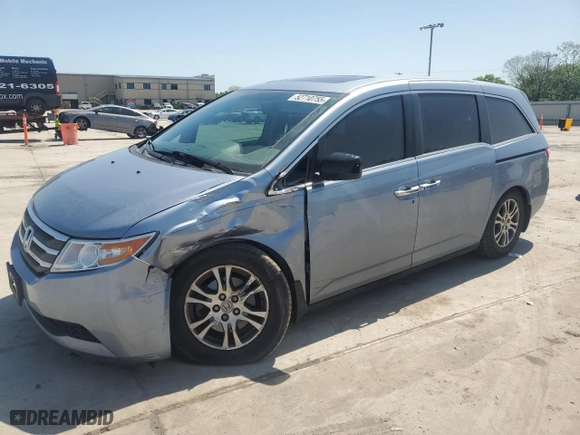 2013 Honda Odyssey EX-L with VIN 5FNRL5H63DB012106, listed as a Copart auction lot 52710755 with 69,674 mi miles and Salvage Title. Bid and sale history available at carsss.com. Image 1.