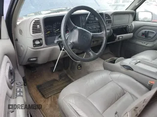 1999 GMC Yukon with VIN 1GKEK13R2XJ739931, listed as a Copart auction lot 74583734 with 115,605 mi miles and Salvage Title. Bid and sale history available at carsss.com. Image 8.