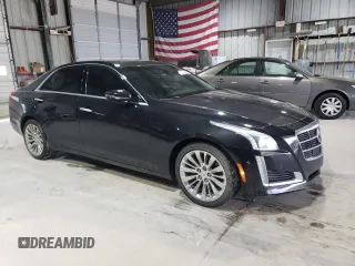 2014 Cadillac CTS Premium AWD с VIN 1G6AZ5S36E0184319, выставлен на аукционе Copart как лот 57847875 с пробегом 86 669 миль миль и Списание • Salvage title. История ставок и продаж доступна на DreamBid. Изображение 4.