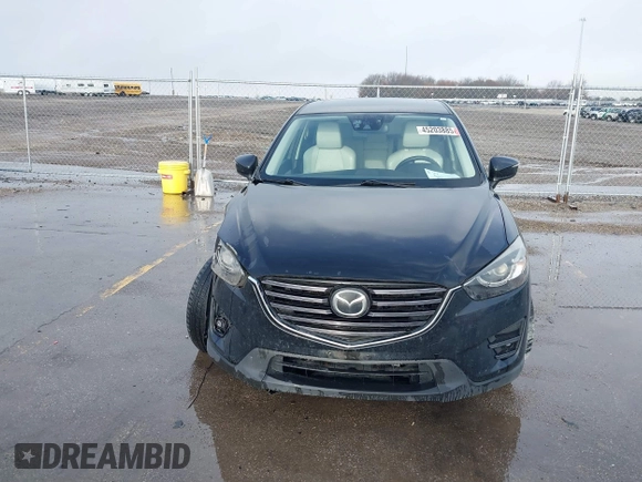 2016 Mazda CX-5 Grand Touring with VIN JM3KE4DY3G0769448, listed as a IAAI auction lot 41947725 with 154,051 mi miles and . Bid and sale history available at carsss.com. Image 12.