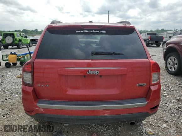 2016 Jeep Compass Sport SE with VIN 1C4NJDBB0GD759999, listed as a Copart auction lot 56983255 with 69,548 mi miles and Salvage title. Bid and sale history available at DreamBid. Image 6.