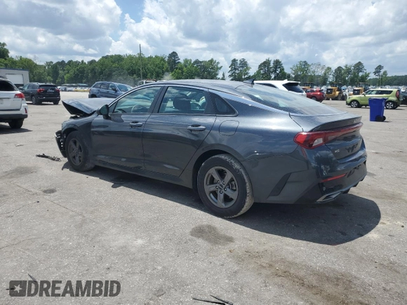 2023 Kia K5 LXS z VIN 5XXG14J21PG213387, wystawiony jako Copart lot #57720055 z przebiegiem 24 559 mil mil oraz Szkoda całkowita • Salvage title. Historia ofert i sprzedaży dostępna na DreamBid. Obrazek 2.