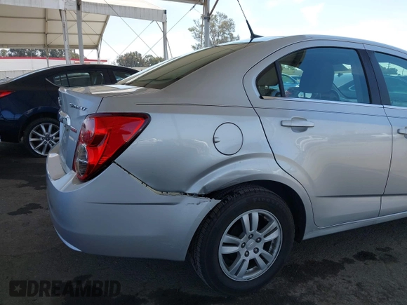 2013 Chevrolet Sonic LT with VIN 1G1JC5SB2D4243632, listed as a IAAI auction lot 42072421 with 40,289 mi miles and . Bid and sale history available at DreamBid. Image 6.