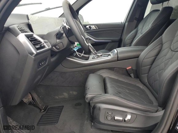 2024 BMW X5 xDrive40i with VIN 5UX23EU00R9U62752, listed as a Copart auction lot 85104184 with 23,547 mi miles and Salvage Title. Bid and sale history available at carsss.com. Image 7.
