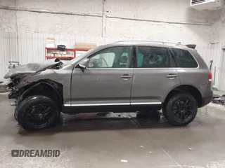 2008 Volkswagen Touareg V6 с VIN WVGBE77L18D028912, выставлен на аукционе IAAI как лот 41615381 с пробегом 182 982 миль миль и . История ставок и продаж доступна на DreamBid. Изображение 14.