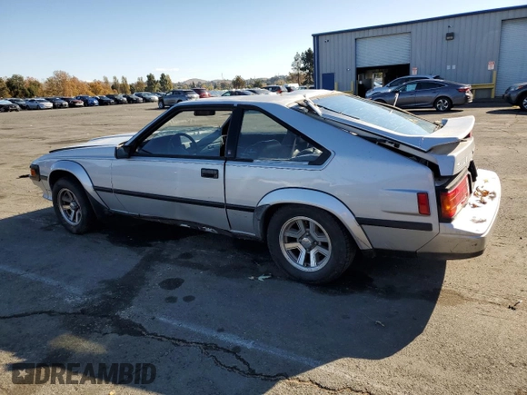 1986 Toyota Supra z VIN JT2MA67L9G0175108, wystawiony jako Copart lot #80793984 z przebiegiem 158 959 mil mil oraz Szkoda całkowita • Salvage title. Historia ofert i sprzedaży dostępna na DreamBid. Obrazek 2.