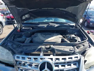 2010 Mercedes-Benz M 350 with VIN 4JGBB5GB0AA570448, listed as a IAAI auction lot 41911210 with 166,489 mi miles and . Bid and sale history available at DreamBid. Image 10.