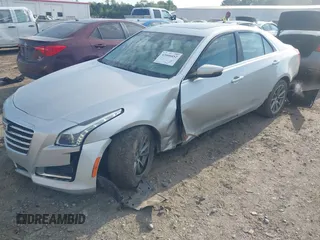 2019 Cadillac CTS Luxury RWD z VIN 1G6AR5SSXK0101168, wystawiony jako IAAI lot #42000452 z przebiegiem 13 114 mil mil oraz . Historia ofert i sprzedaży dostępna na DreamBid. Obrazek 18.