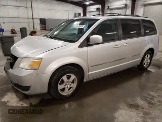 2010 Dodge Grand Caravan SXT with VIN 2D4RN5D19AR409665, listed as a Copart auction lot 46676445 with 174,063 mi miles and Salvage Title. Bid and sale history available at DreamBid. Image 1.