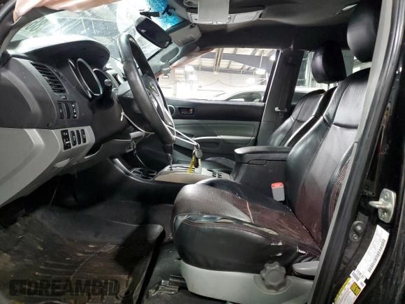 2012 Toyota Tacoma with VIN 3TMMU4FN9CM045018, listed as a Copart auction lot 86800104 with 205,942 mi miles and Salvage title. Bid and sale history available at DreamBid. Image 7.