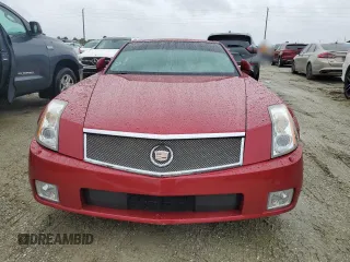2005 Cadillac XLR z VIN 1G6YV34AX55600837, wystawiony jako Copart lot #75055604 z przebiegiem Nie podano mil oraz Szkody całkowita. Historia ofert i sprzedaży dostępna na DreamBid. Obrazek 5.