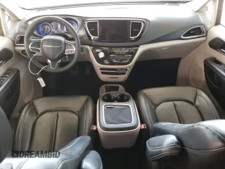 2023 Chrysler Pacifica Touring L with VIN 2C4RC1BG1PR581376, listed as a Copart auction lot 59901915 with 57,411 mi miles and Salvage title. Bid and sale history available at DreamBid. Image 8.