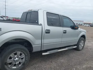 2011 Ford F-150 XLT with VIN 1FTFW1ET4BFB81296, listed as a IAAI auction lot 41935528 with 386,703 mi miles. Bid and sale history available at carsss.com. Image 13.