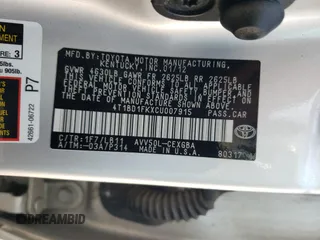 2012 Toyota Camry XLE z VIN 4T1BD1FKXCU007915, wystawiony jako Copart lot #60313605 z przebiegiem 186 574 mil mil oraz Szkoda całkowita • Salvage title. Historia ofert i sprzedaży dostępna na DreamBid. Obrazek 12.