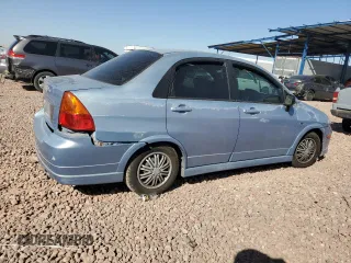 2006 Suzuki Aerio Premium z VIN JS2RA62S665301623, wystawiony jako Copart lot #77708054 z przebiegiem 189 464 mil mil oraz Szkoda całkowita • Salvage title. Historia ofert i sprzedaży dostępna na DreamBid. Obrazek 3.