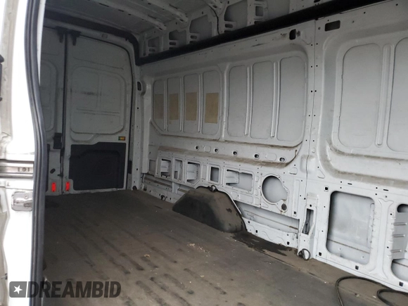 2019 Ford Transit Cargo with VIN 1FTBW3XM7KKA39855, listed as a Copart auction lot 85120994 with 121,522 mi miles and Salvage Title. Bid and sale history available at DreamBid. Image 11.