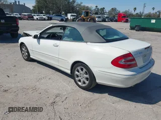 2004 Mercedes-Benz CLK 320 z VIN WDBTK65GX4T018556, wystawiony jako IAAI lot #41546296 z przebiegiem 100 585 mil mil oraz . Historia ofert i sprzedaży dostępna na DreamBid. Obrazek 3.