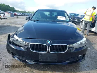 2013 BMW 3 Series 320i xDrive with VIN WBA3C3C52DF979114, listed as a IAAI auction lot 42439598 with 111,458 mi miles and . Bid and sale history available at DreamBid. Image 12.