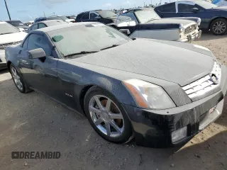 2006 Cadillac XLR z VIN 1G6YV36A965600309, wystawiony jako Copart lot #73937584 z przebiegiem Nie podano mil oraz Szkody całkowita. Historia ofert i sprzedaży dostępna na DreamBid. Obrazek 4.