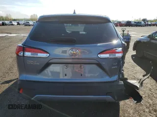 2022 Toyota Corolla Cross LE with VIN 7MUCAABGXNV025847, listed as a Copart auction lot 49153095 with 37,789 mi miles and Salvage title. Bid and sale history available at DreamBid. Image 6.
