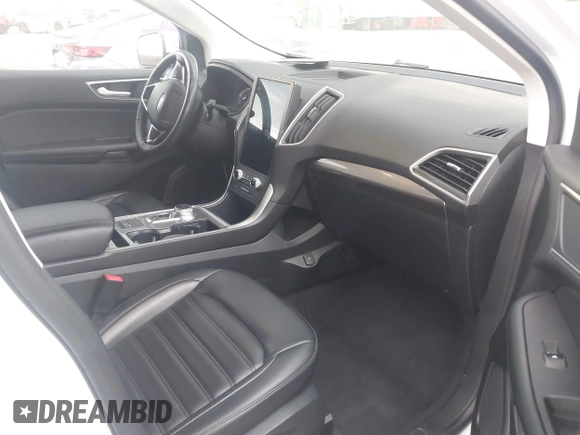 2024 Ford Edge SEL z VIN 2FMPK4J90RBA77889, wystawiony jako IAAI lot #42484303 z przebiegiem 51 211 mil mil oraz . Historia ofert i sprzedaży dostępna na DreamBid. Obrazek 5.