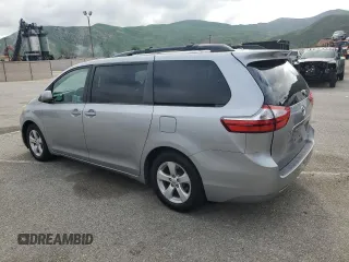 2015 Toyota Sienna LE AAS with VIN 5TDKK3DC5FS584877, listed as a Copart auction lot 50744255 with 164,556 mi miles and Salvage Title. Bid and sale history available at carsss.com. Image 2.