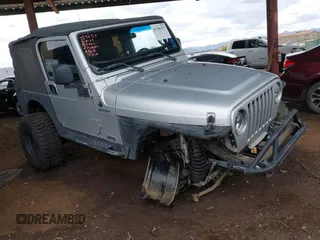 2006 Jeep Wrangler Sport with VIN 1J4FA49S46P748604, listed as a IAAI auction lot 41788157 with 128,249 mi miles. Bid and sale history available at carsss.com. Image 6.