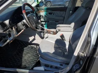 1999 BMW 7 Series 740il with VIN WBAGH8336XDP01928, listed as a Copart auction lot 46173335 with 186,943 mi miles and Salvage Title. Bid and sale history available at carsss.com. Image 7.