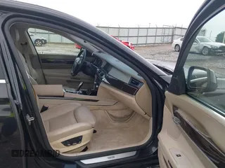 2010 BMW 7 Series 750Li with VIN WBAKB8C54ACY63650, listed as a IAAI auction lot 42756245 with 127,405 mi miles and . Bid and sale history available at DreamBid. Image 5.