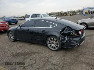 2012 Audi A7 Prestige с VIN WAU2GAFC4CN059522, выставлен на аукционе Copart как лот 53102935 с пробегом 145 401 миль миль и Списание • Salvage title. История ставок и продаж доступна на DreamBid. Изображение 2.