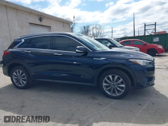 2021 Infiniti QX50 Luxe with VIN 3PCAJ5BB7MF123895, listed as a IAAI auction lot 41811100 with 23,164 mi miles and . Bid and sale history available at DreamBid. Image 14.