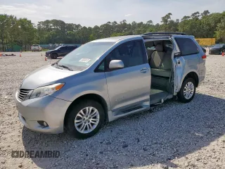 2014 Toyota Sienna XLE z VIN 5TDYK3DC2ES518294, wystawiony jako Copart lot #56699075 z przebiegiem 80 887 mil mil oraz Szkoda całkowita • Salvage title. Historia ofert i sprzedaży dostępna na DreamBid. Obrazek 1.