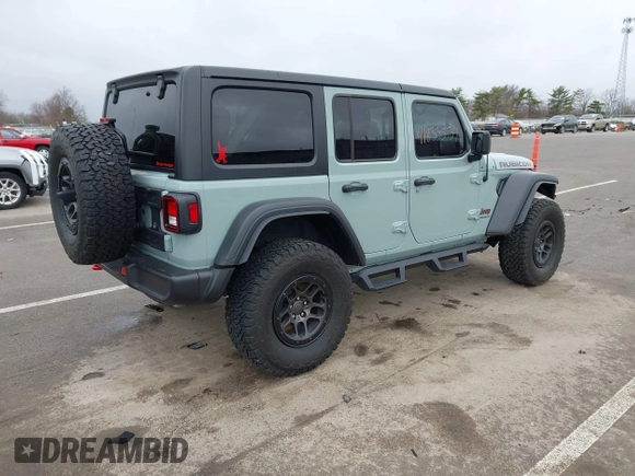 2023 Jeep Wrangler Rubicon with VIN 1C4JJXFG7PW654564, listed as a IAAI auction lot 41833534 with 22,277 mi miles and . Bid and sale history available at DreamBid. Image 4.