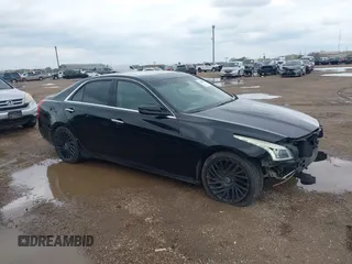 2019 Cadillac CTS Sedan Luxury RWD with VIN 1G6AR5SS9K0100254, listed as a IAAI auction lot 41308877 with 129,821 mi miles. Bid and sale history available at carsss.com. Image 1.