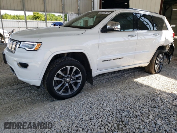2018 Jeep Grand Cherokee Overland z VIN 1C4RJFCG4JC425589, wystawiony jako Copart lot #61775775 z przebiegiem 102 040 mil mil oraz Szkoda całkowita • Salvage title. Historia ofert i sprzedaży dostępna na DreamBid. Obrazek 1.